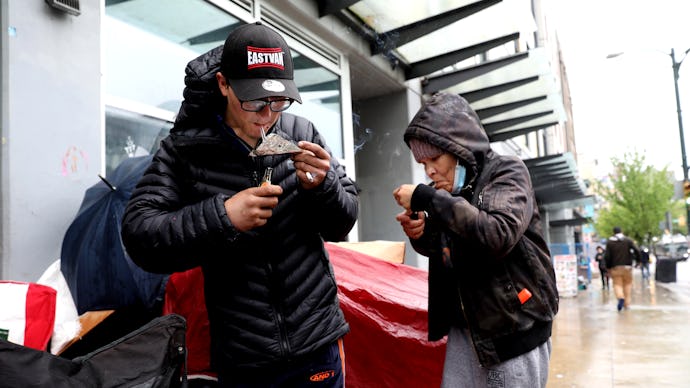 VANCOUVER, BRITISH COLUMBIA - MAY 03: Tyler Dixon, 26, left, of Abbotsford, and Kim Baptiste, 45, of...