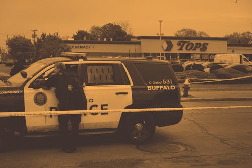 BUFFALO, NEW YORK - MAY 16: Police and FBI agents continue their investigation of the shooting at To...