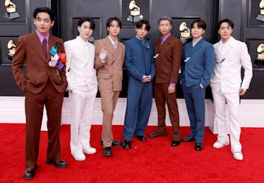 Fans think the BTS members got matching "7" tattoos in celebration of their ninth anniversary as a g...