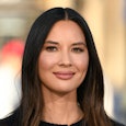 Olivia Munn lost half of her son's formula supply while traveling. Here, she visits "Extra" at Unive...