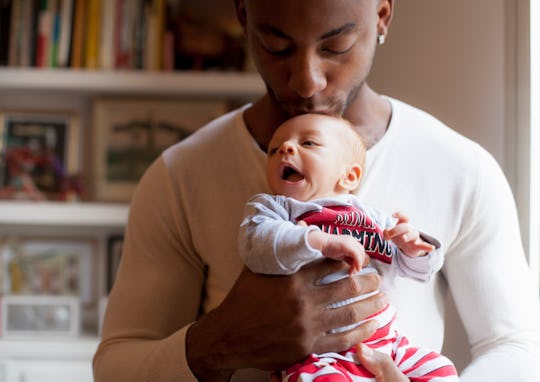 dad holding baby, best father's day quotes from wives