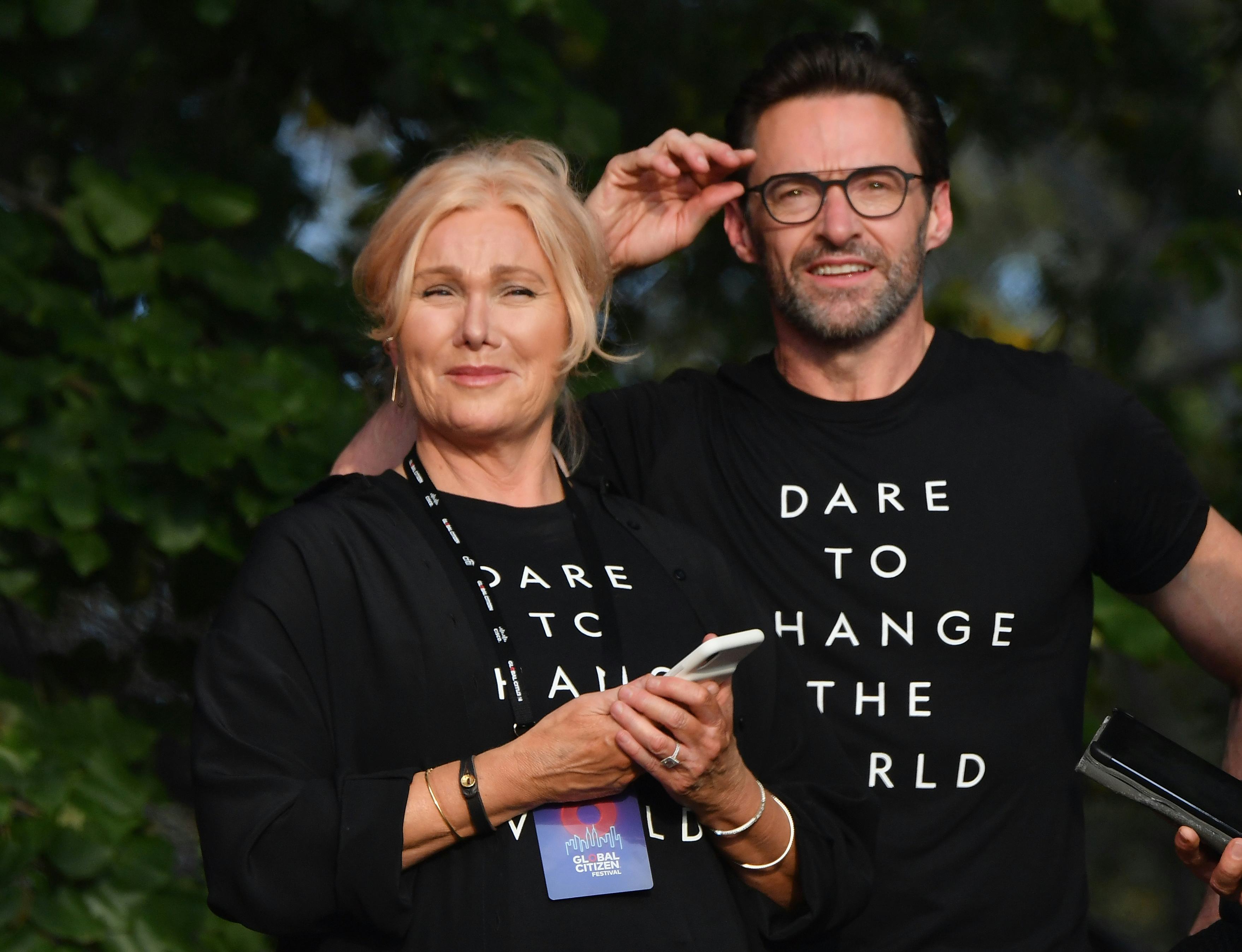 Australian actress Deborra-Lee Furness (L) and husband Australian actor Hugh Jackman look on onstage&hellip;