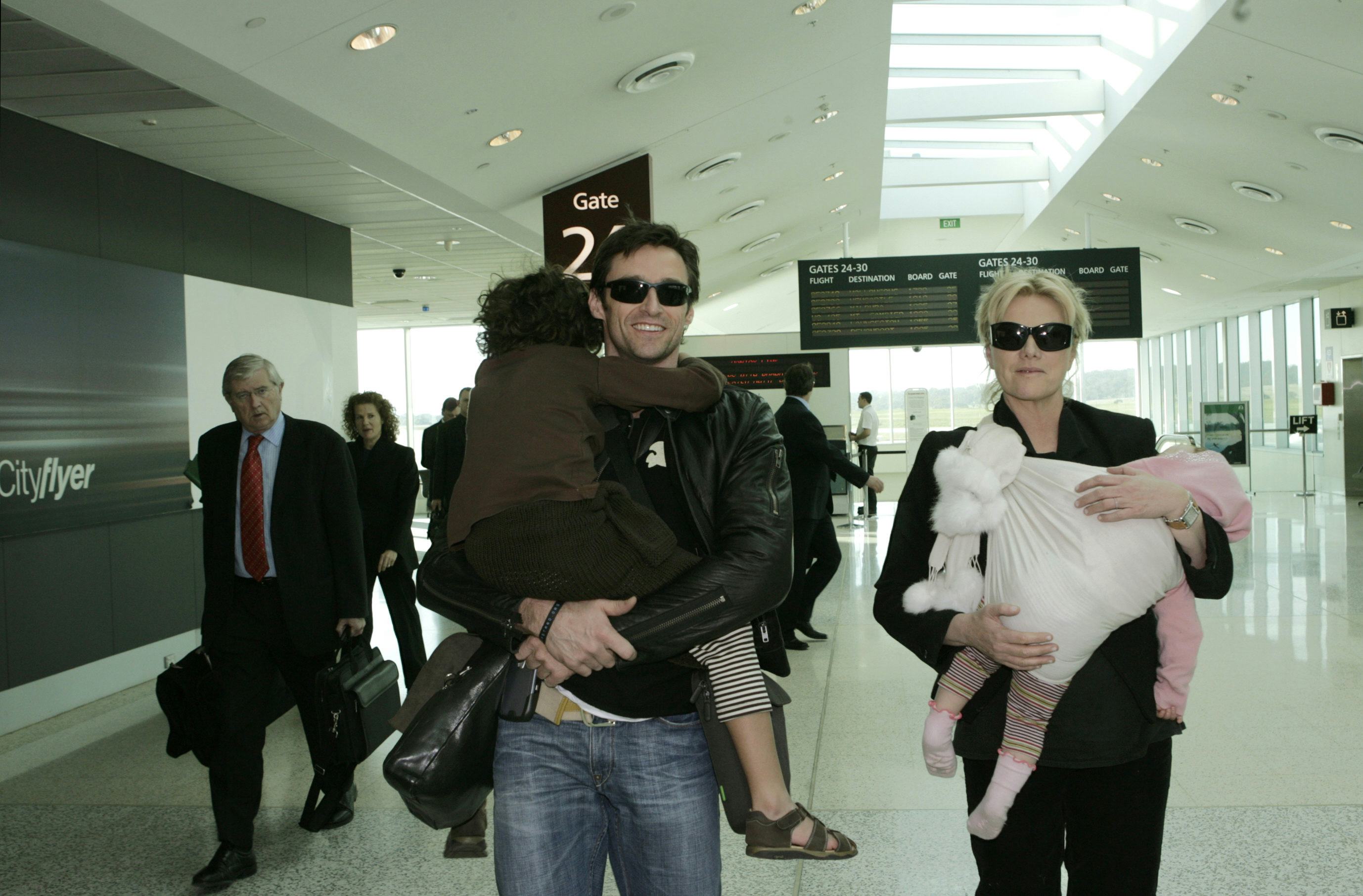 Hugh Jackman arrives at Melbourne Airport with partner Deborra-Lee Furness and their children on 8th&hellip;