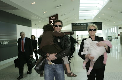 Hugh Jackman arrives at Melbourne Airport with partner Deborra-Lee Furness and their children on 8th...