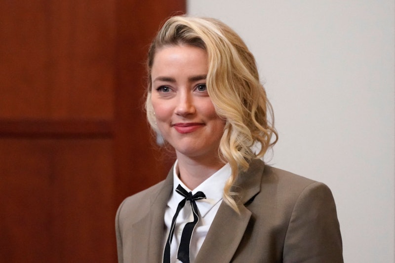 Actor Amber Heard arrives into the courtroom after a break at the Fairfax County Circuit Courthouse ...