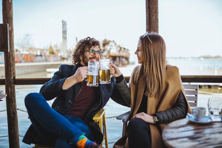 couple having beer together on a creative date night