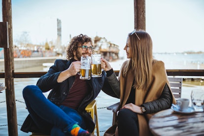 couple having beer together on a creative date night