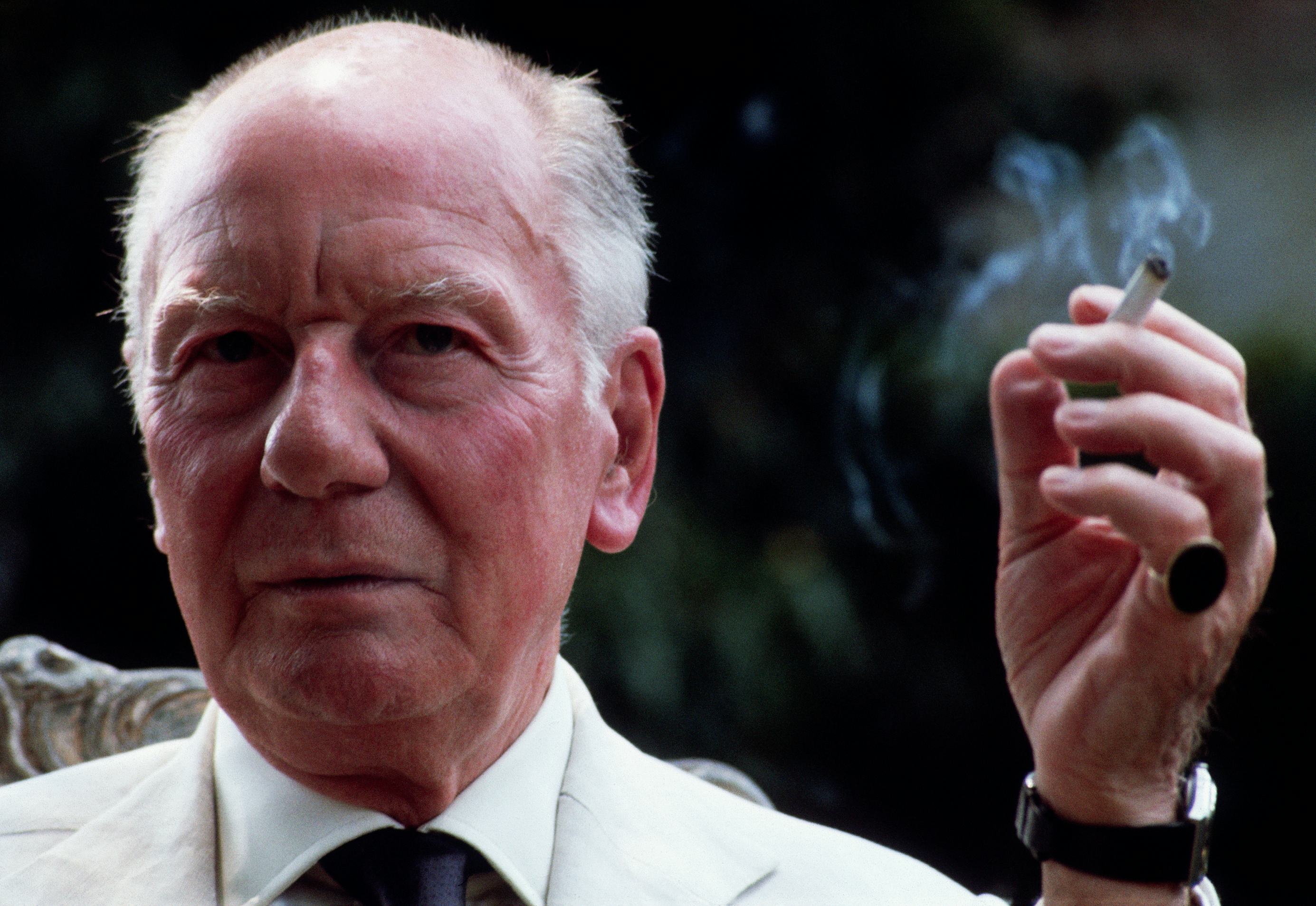 EGOT John Gielgud, smoking a cigarette.