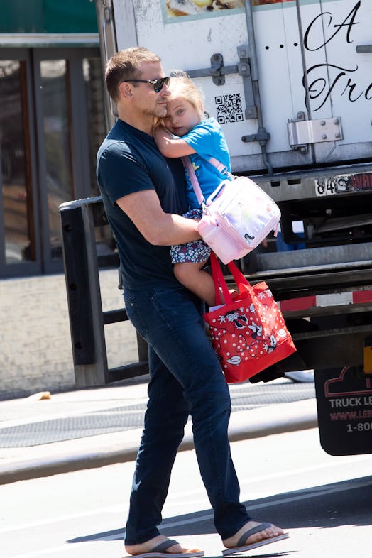 Bradley Cooper loves being a dad.