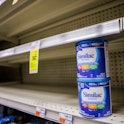Shelves normally meant for baby formula sit nearly empty at a store in downtown Washington, DC, on M...