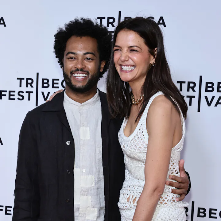 Katie Holmes and her boyfriend Bobby Wooten III cuddled up as they attended the "Alone Together" pre...