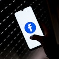 In this photo illustration a Facebook logo seen displayed on a smartphone screen in Athens, Greece o...