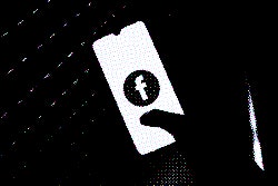 In this photo illustration a Facebook logo seen displayed on a smartphone screen in Athens, Greece o...