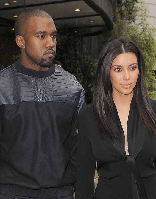 Kim Kardashian and her boyfriend Kanye West leave their hotel on May 22, 2012 in London, England.