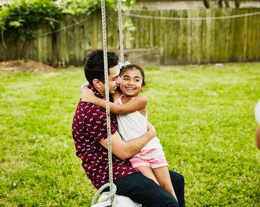 girl sitting on uncle's lap, instagram captions for your uncle on father's day
