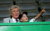 Rod Stewart in the stands with son Aiden during the UEFA Champions League third qualifying round sec...