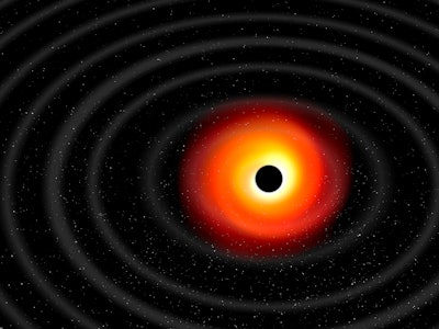 Gravitational waves from a black hole, illustration.