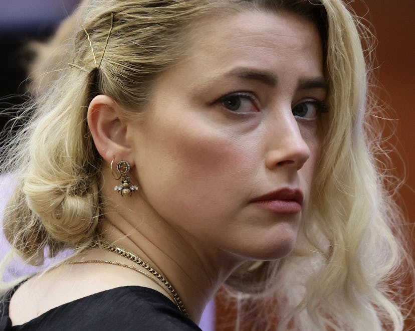 Actor Amber Heard waits before the jury said that they believe she defamed ex-husband Johnny Depp wh...