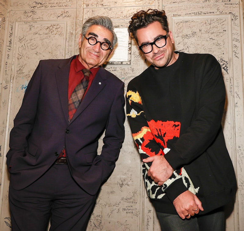 Dan Levy and Eugene Levy are father and son IRL and on 'Schitt's Creek.' Photo via Getty Images