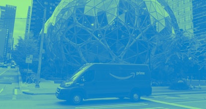 Seattle, USA - Oct 18, 2021: Late in the day an Amazon prime delivery truck passing the Spheres at t...