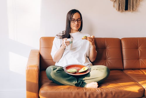 A woman eats avocado toast. Here's your daily horoscope for june 3, 2022