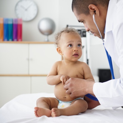 baby getting examined by pediatrician to assess infant cough