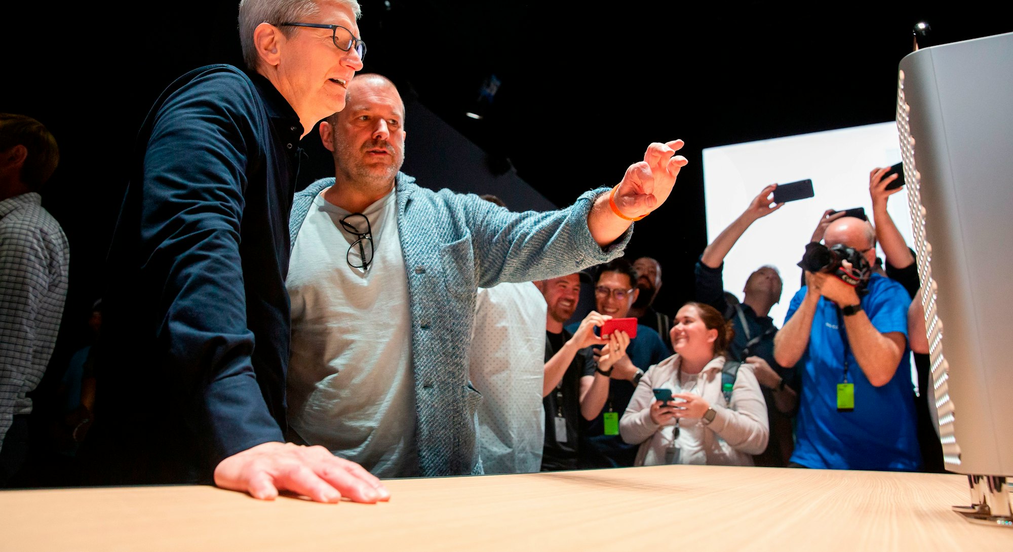 Apple CEO Tim Cook (left) and Apple's Chief Design Officer Jonathan Ive look over the new Mac Pro Di...