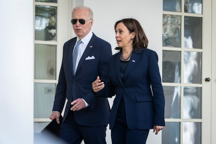 President Joe Biden and Vice President Kamala Harris walk back to the Oval Office after an event abo...