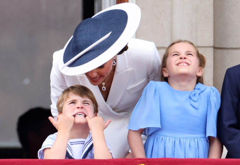 Prince Louis of Cambridge pulls a face as he watches the RAF fly past with Catherine, Duchess of Cam...