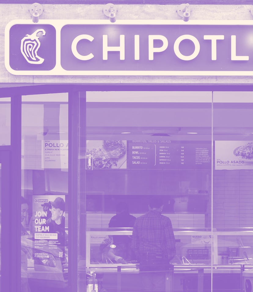 SAN FRANCISCO, CALIFORNIA - APRIL 26: A customer orders food at a Chipotle restaurant on April 26, 2...