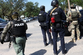 UVALDE, TEXAS - MAY 29: Law enforcement officials prepare for the arrival of President Joe Biden's a...