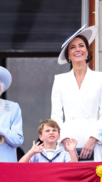 Prince Charles, Queen Elizabeth II, Prince Louis, Kate Middleton, and Princess Charlotte watch the R...