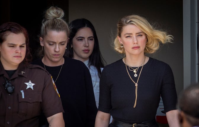 FAIRFAX, VA - JUNE 1: Actress Amber Heard, right, and her sister Whitney Heard, second left, depart ...