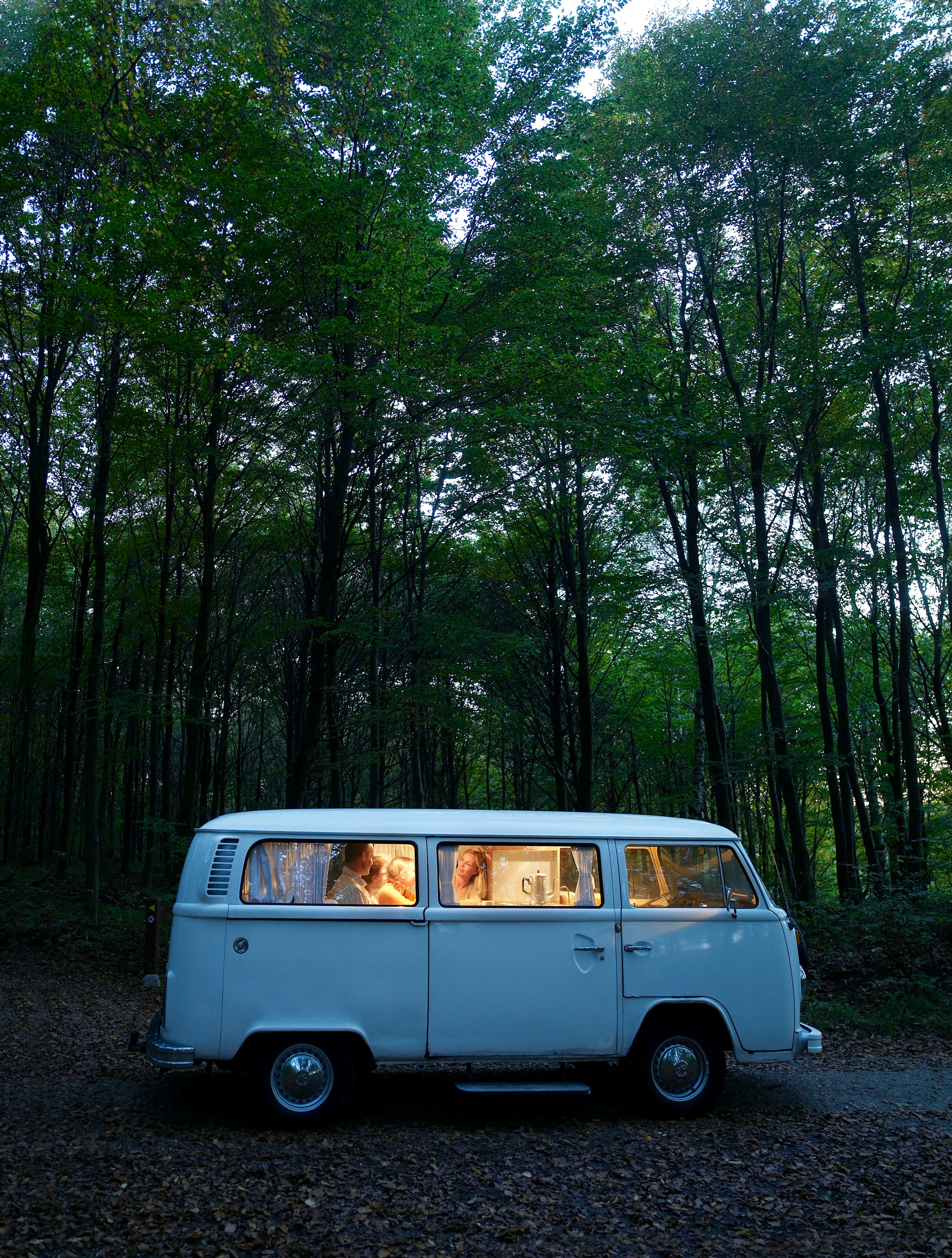 vintage van in the woods, best summer travel destinations for families