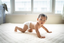 baby crawling on bed, baby names that start with j