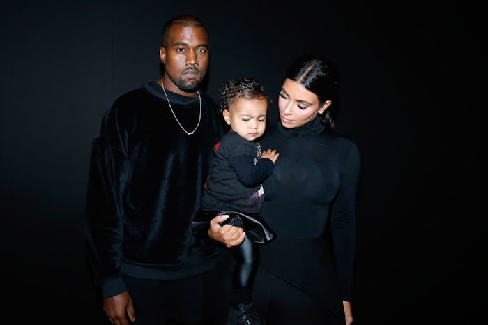 PARIS, FRANCE - SEPTEMBER 24: Kanye West, Kim Kardashian and their daughter North West attend the B...