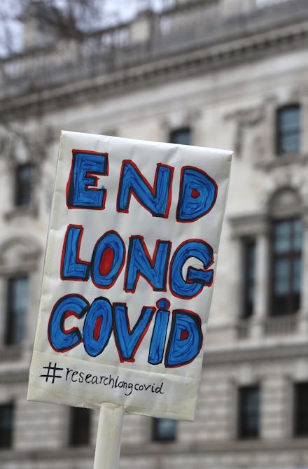 LONDON, UNITED KINGDOM - 2022/03/09: A protester holds up a placard demanding research and an end to...