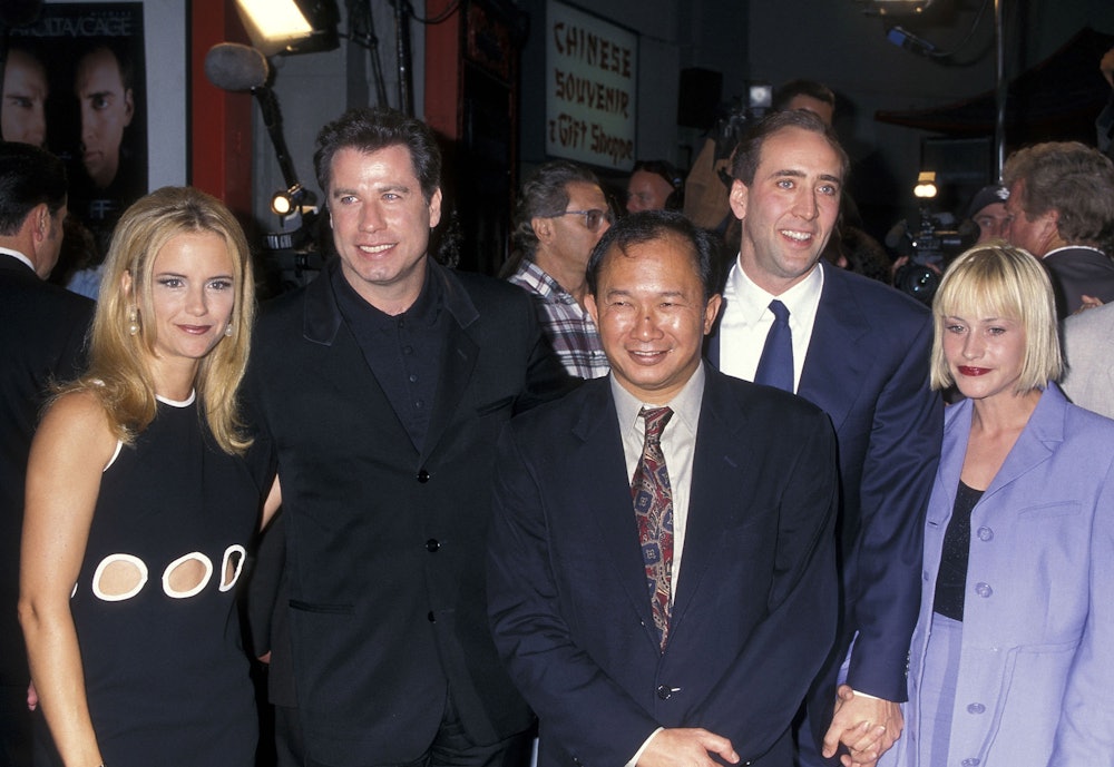 Actor John Travolta, actress Kelly Preston, director John Woo, actor Nicolas Cage and actress Patric...