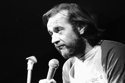 American comedian and author George Carlin (1937 - 2008) performs onstage, Lansing, Michigan, Octobe...