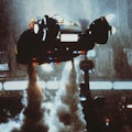 A 'Spinner' flying car takes off in a scene from Ridley Scott's futuristic thriller 'Blade Runner', ...