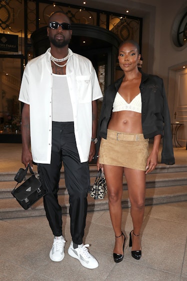 Gabrielle Union and Dwyane Wade are seen ahead of a show during Milan Fashion Week S/S 2023 