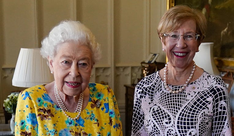 Britain's Queen Elizabeth II poses for pictures with Governor of New South Wales Margaret Beazley (R...