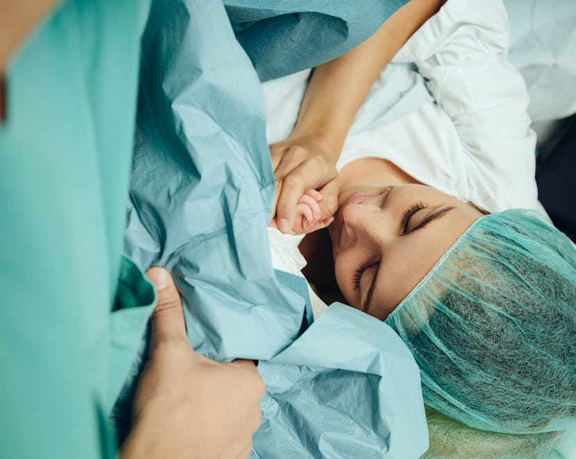 woman about to get a c-section in hospital, do they break your water for a c-section