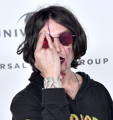 LOS ANGELES, CALIFORNIA - JANUARY 26:  Ezra Miller attends the Universal Music Group Hosts 2020 Gram...