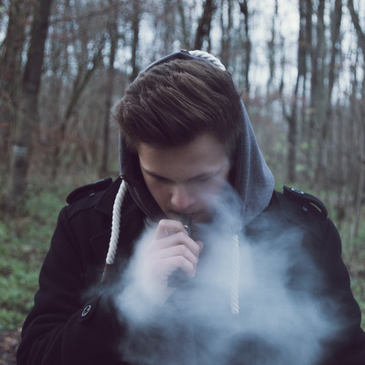 Teen boy vaping high potency THC, which several studies have linked to an increase in the onset of p...