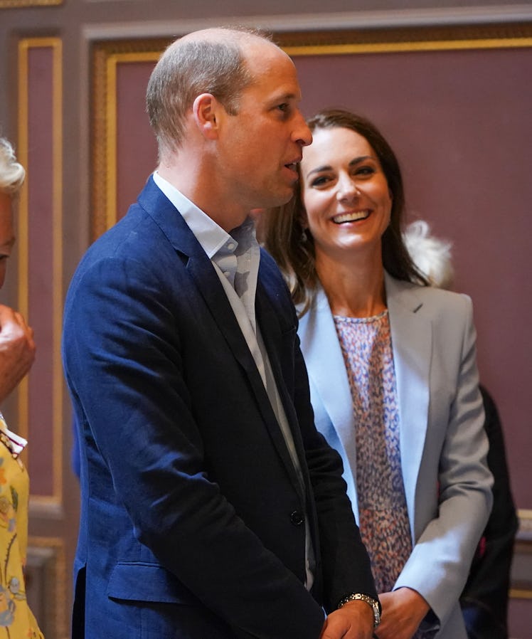 Donning bright smiles, Prince William and Kate reportedly viewed the grand painting before going on ...