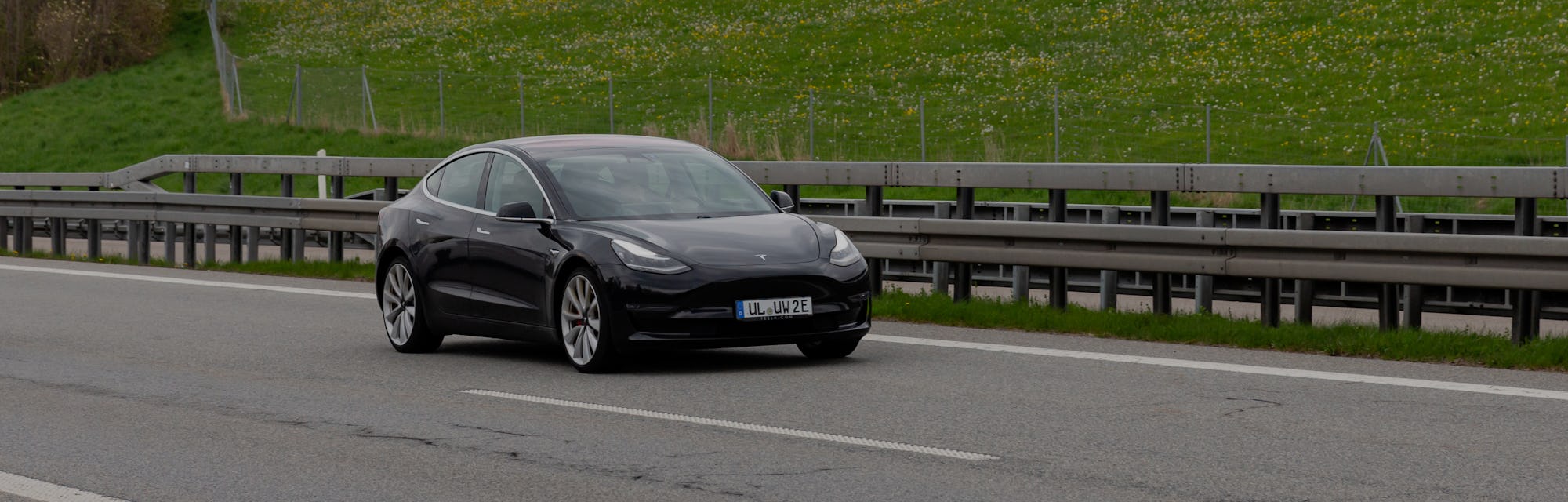 Kempten, Allgäu, Schwaben, Bavaria, Germany, may 1st 2022, a black German electric Tesla model 3 fro...