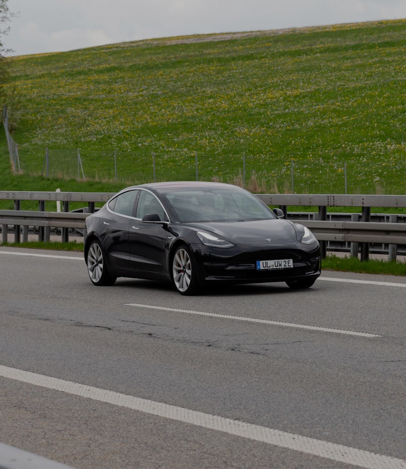 Kempten, Allgäu, Schwaben, Bavaria, Germany, may 1st 2022, a black German electric Tesla model 3 fro...