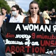 A protestor holds a sign during a rally in support of worldwide abortion rights in Paris, after the ...