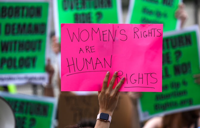 WASHINGTON, UNITED STATES - JUNE 24: Abortion rights demonstrators hold signs outside the US Supreme...